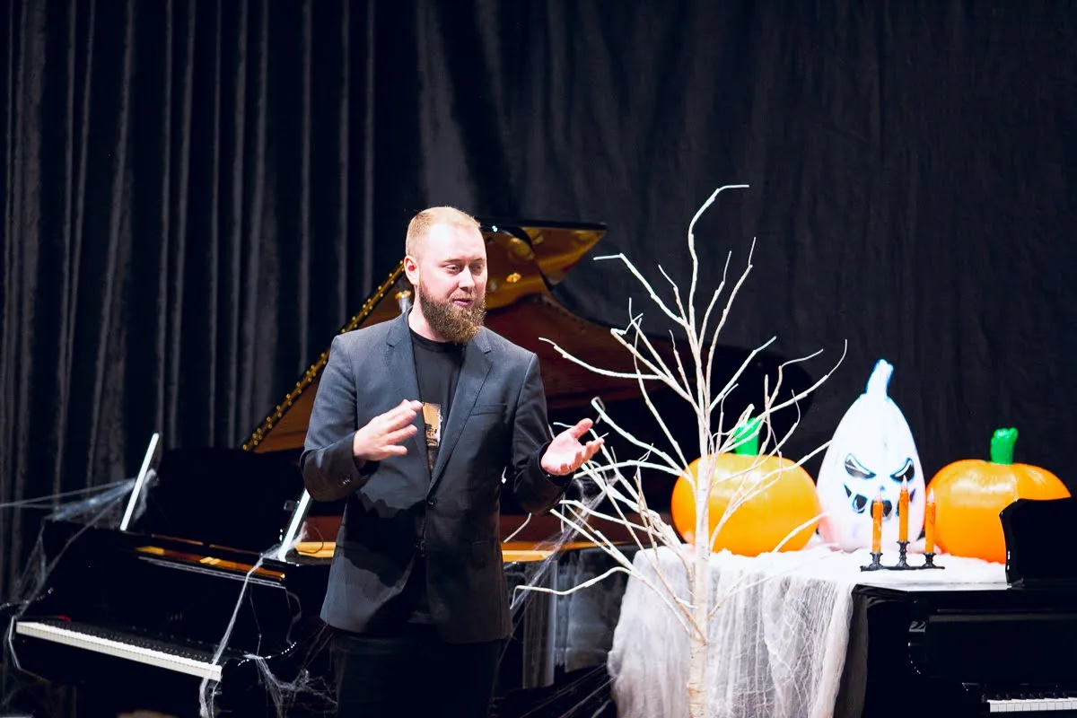 Dr. Vitaly Serebriakov performing at the piano